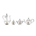 A mid-19th century French 950 standard silver and gold mounted four-piece bachelor tea and coffee