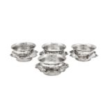 A set of four early 20th century Chinese Export silver tea bowls and saucers, Tianjin circa 1920 by