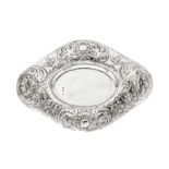 A large Victorian 'Arts and Crafts' Britannia Standard silver dish, London 1899 by Gilbert Marks