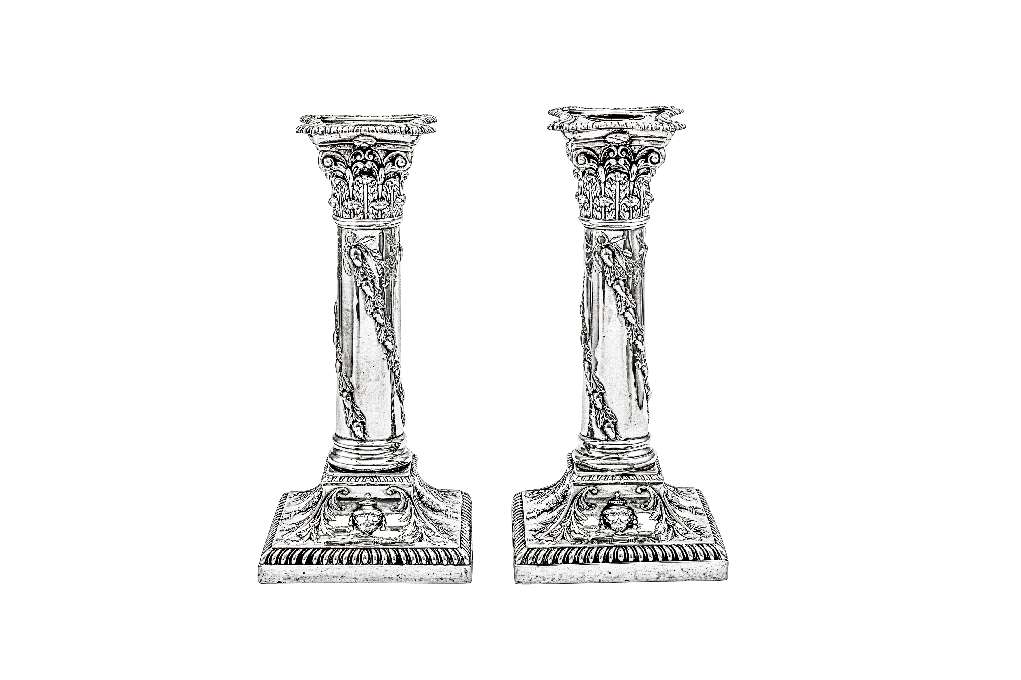 A pair of Victorian sterling silver candlesticks, London 1899 by Thomas Bradbury and Sons