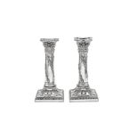 A pair of Victorian sterling silver candlesticks, London 1899 by Thomas Bradbury and Sons