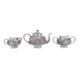 An early 20th century Anglo – Indian unmarked silver three-piece tea service, Calcutta circa 1910