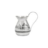 An early 20th century Iraqi silver and niello milk jug, circa 1930 signed Omara Amir