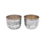 Two similar Catherine II mid-18th century Russian 84 zolotnik silver vodka cups (charka), Moscow