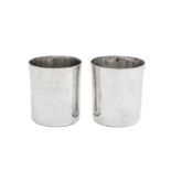 A pair of Elizabeth II hand crafted Britannia standard silver beakers, London 1970 by Ronald Napier