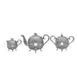 A late 19th century Anglo-Indian three-piece tea service, Cutch circa 1890 by V.K (unidentified, Wil
