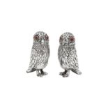 A pair of early 20th century unmarked silver novelty owl pepper pots, German or Dutch circa 1910
