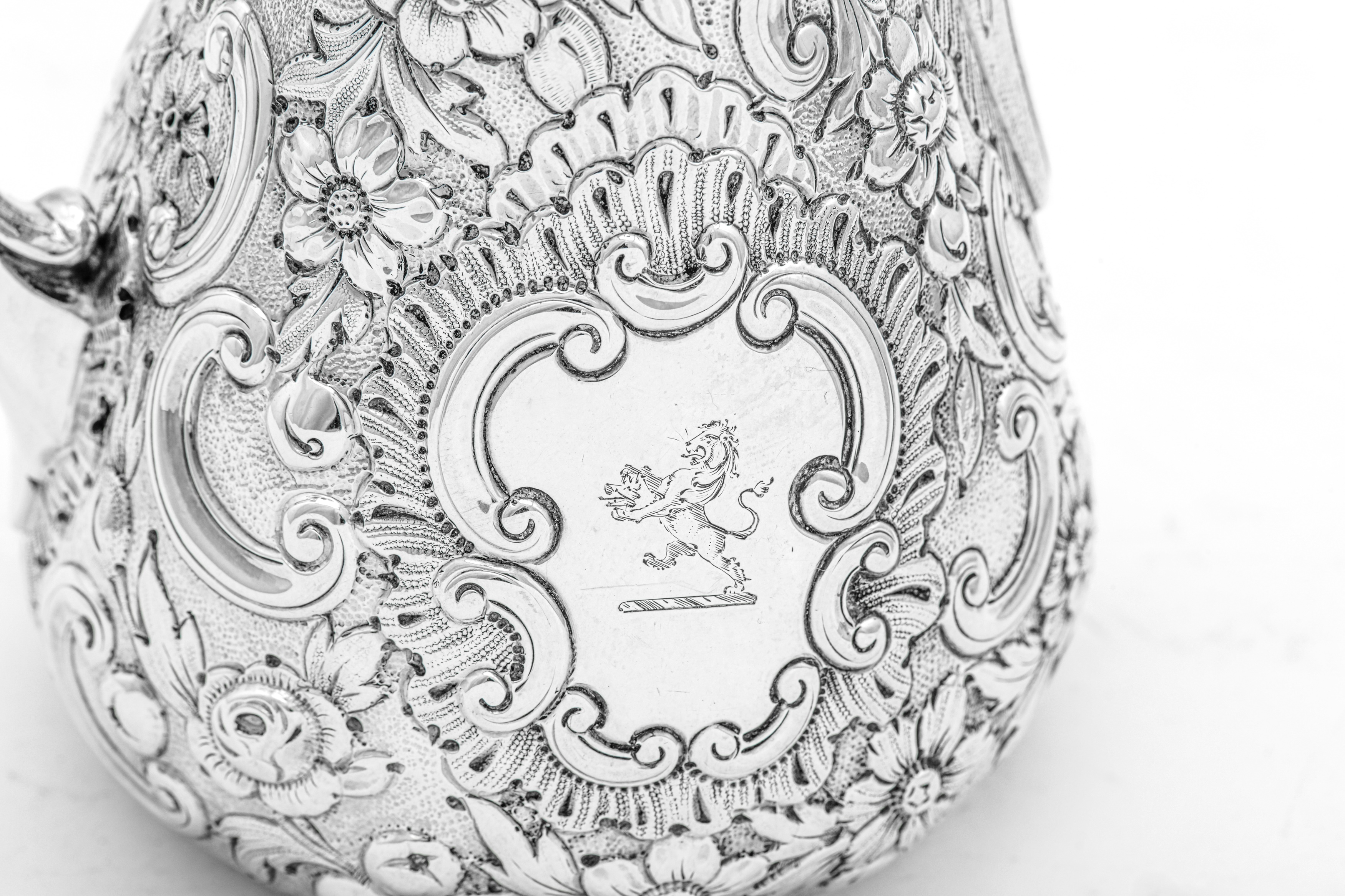 A Victorian sterling silver milk jug, London 1856 by Edward & John Barnard - Image 3 of 4