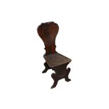 A LATE GEORGE II/EARLY GEORGE III OAK SGABELLO HALL CHAIR, CIRCA 1760