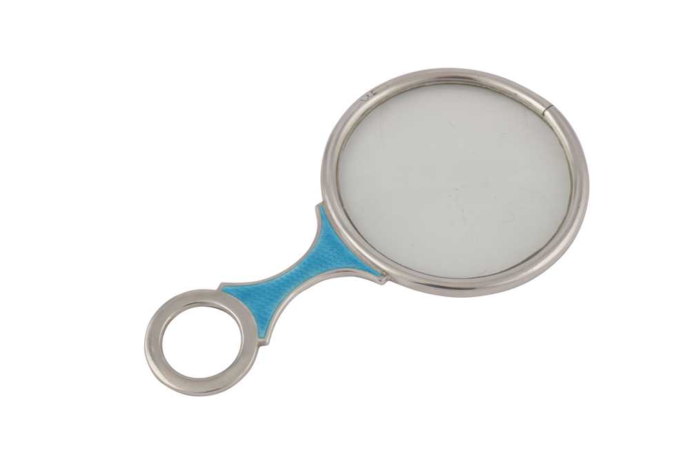 A GEORGE V STERLING SILVER AND BLUE GUILLOCHE ENAMEL MAGNIFYING GLASS