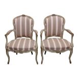 A PAIR OF LOUIS XVI STYLE PAINTED AND DISTRESSED BEECH FAUTEUIL ARMCHAIRS, 19TH CENTURY