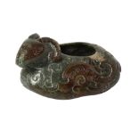 A CHINESE GREEN JADE 'RAM' WASHER