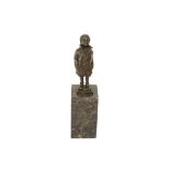 A DECORATIVE BRONZE FIGURE OF A BOY IN A COAT,