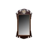 A GEORGIAN STYLE FRET CARVED WALL MIRROR