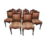 A SET OF TEN UNUSUAL 19TH CENTURY OAK DINING CHAIRS