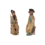 A PAIR OF CHINESE POTTERY FIGURES OF A GENTLEMAN AND LADY, 20TH CENTURY
