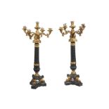 A PAIR OF PATINATED BRONZE AND GILT BRONZE FIVE LIGHT CANDELABRA, LATE 20TH/21ST CENTURY