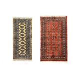 A LOT OF TWO PAKISTANI BOKHARA RUGS