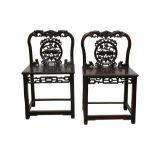 A PAIR OF CHINESE HARDWOOD CHAIRS