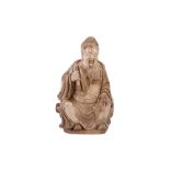 A CHINESE SOAPSTONE FIGURE OF A SEATED OFFICIAL, PROBABLY LATE 19TH/EARLY 20TH CENTURY
