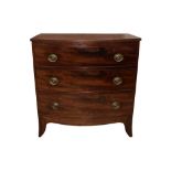 A GEORGE III MAHOGANY BOW FRONT CHEST OF DRAWERS