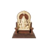 λ AN INDIAN IVORY SCULPTURE OF GANESH, LATE 19TH/EARLY 20TH CENTURY India, late 19th - 20th century