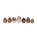 A COLLECTION OF SEVEN HARD STONE MINERAL EGGS