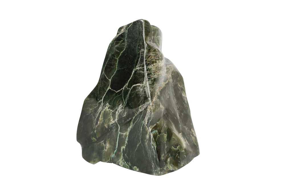 AN EXCEPTIONALLY LARGE BOULDER OF POLISHED JADE, PAKISTAN