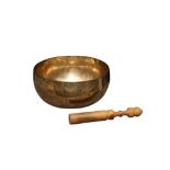 A 19TH CENTURY TIBETAN SINGING BOWL