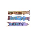 A SET OF THREE EARLY HANGING PAINTED WOOD FAIRGROUND SIGNS