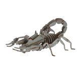 A SEGMENTED METAL MODEL OF A SCORPION