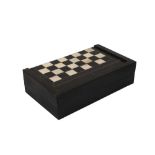 A 17TH CENTURY NORTH ITALIAN EBONY AND IVORY GAMING BOARD FOR CHESS AND BACKGAMMON
