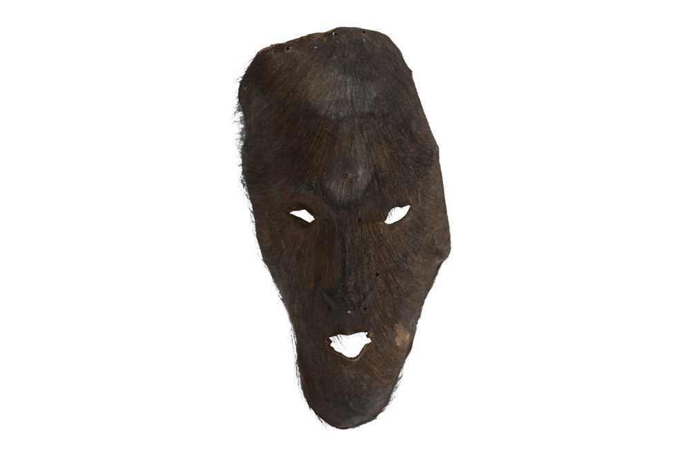 ETHNOGRAPHIC: NEPALESE OR NAGALAND YAK SKIN MASK, MID 20TH CENTURY