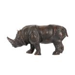 A LEATHER COVERED MODEL OF A RHINOCEROS, PROBABLY LATE 19TH / EARLY 20TH CENTURY