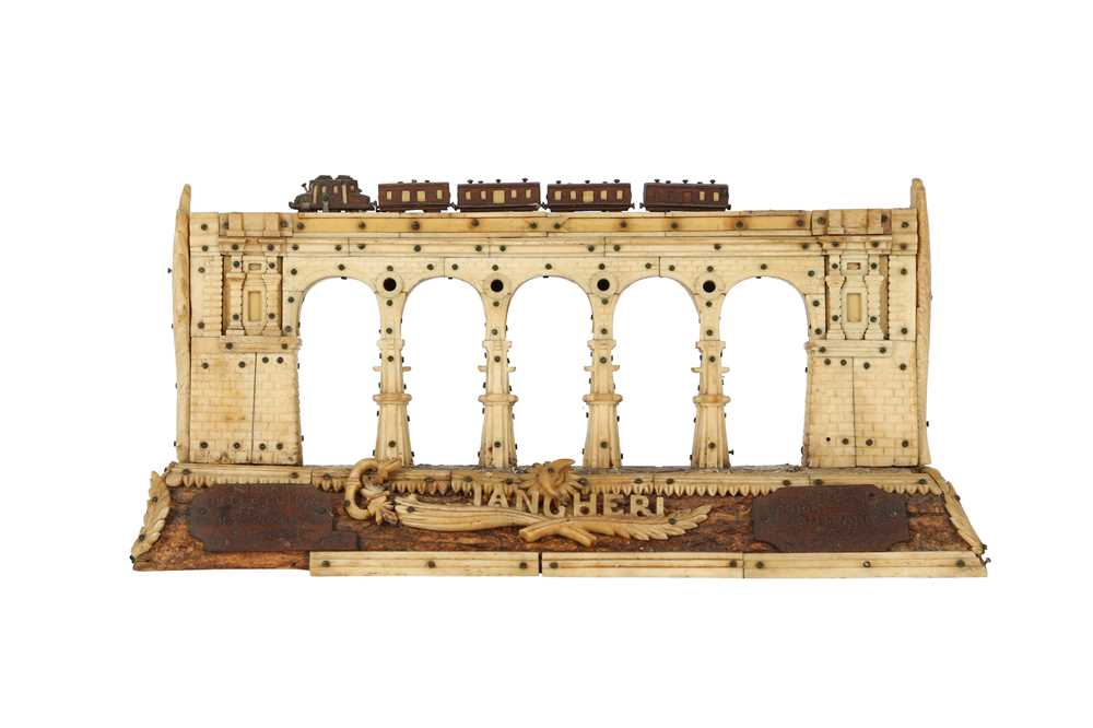 AN ITALIAN WW1 PERIOD CARVED BONE AND WOOD PRISONER OF WAR MODEL OF A RAILWAY BRIDGE DATED 1918