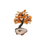 AN AGATE GEODE AND CITRINE MODEL OF A TREE IN BLOSSOM