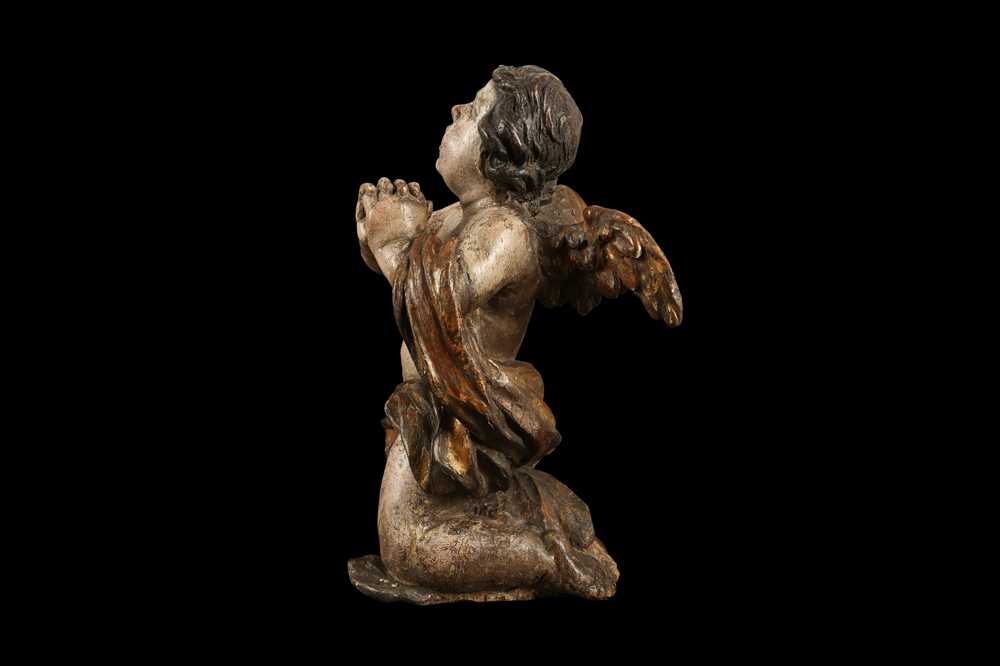 AN EARLY 17TH CENTURY SOUTH GERMAN POLYCHROME DECORATED AND CARVED WOOD FIGURE OF A CHERUB - Image 5 of 7