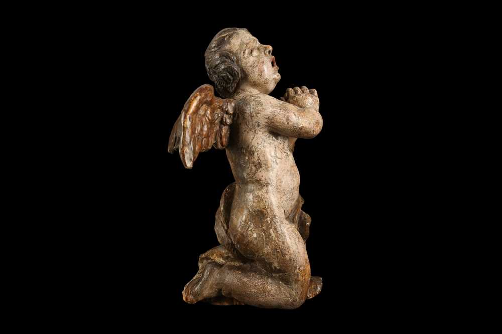 AN EARLY 17TH CENTURY SOUTH GERMAN POLYCHROME DECORATED AND CARVED WOOD FIGURE OF A CHERUB - Image 6 of 7