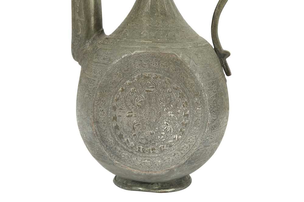 A QAJAR GOLD-DAMASCENED STEEL EWER AND AN ENGRAVED TINNED COPPER EWER Iran, 19th century - Image 5 of 5