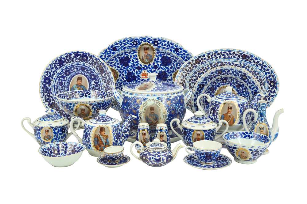 A MIXED SET OF COMMEMORATIVE BLUE AND WHITE PORCELAIN SERVICES MADE FOR THE PERSIAN MARKET Central A
