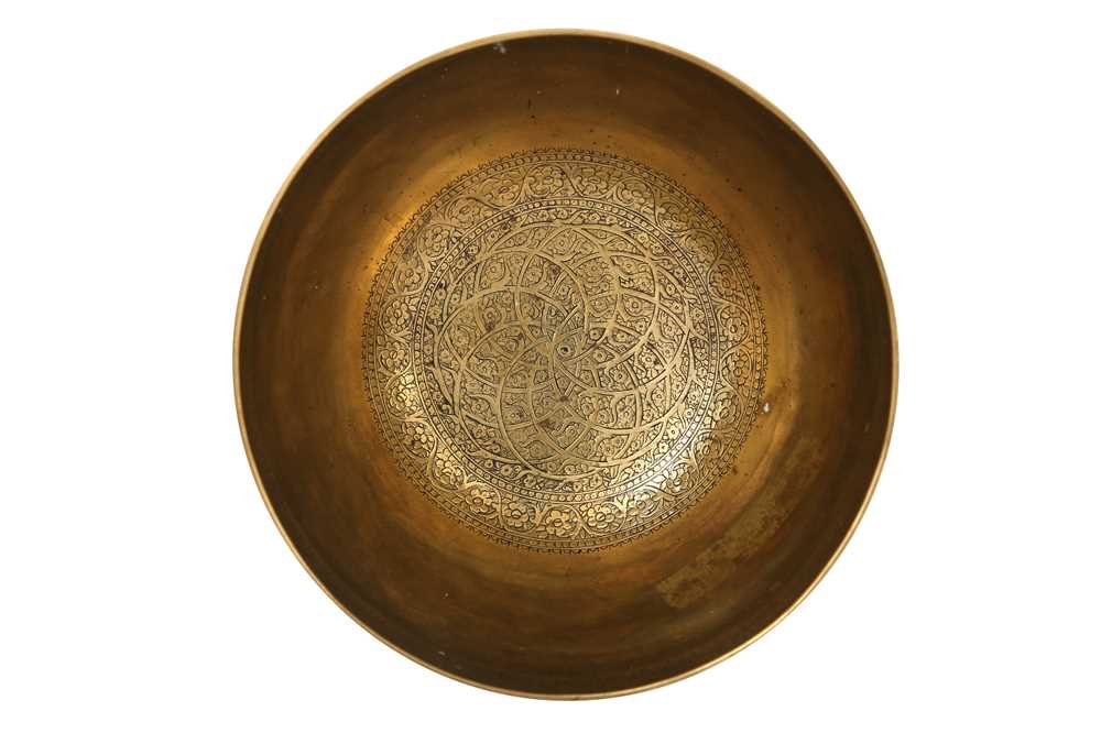 FIVE ENGRAVED BRASS MAGIC BOWLS AND A QAJAR BOWL WITH FIGURAL DECORATION Iran, 19th and 20th century - Image 8 of 9