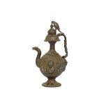 A COPPER ALLOY REPOUSSÉ EWER WITH FIGURAL DECORATION Possibly Kutch or Mumbai, India, 19th century