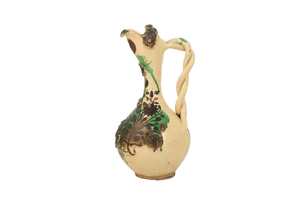 A LARGE GREEN-SPLASHED WHITE-GLAZED CANAKKALE POTTERY EWER Ottoman Turkey, 19th century - Image 6 of 8