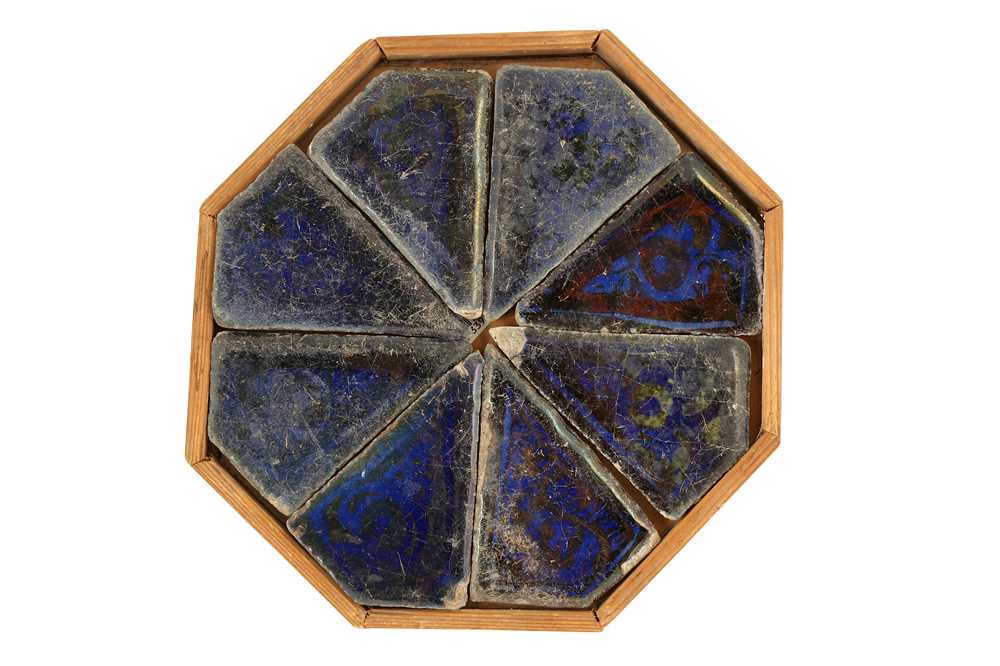 EIGHT COBALT BLUE AND COPPER LUSTRE-PAINTED POTTERY TILES Iran, 17th - 18th century