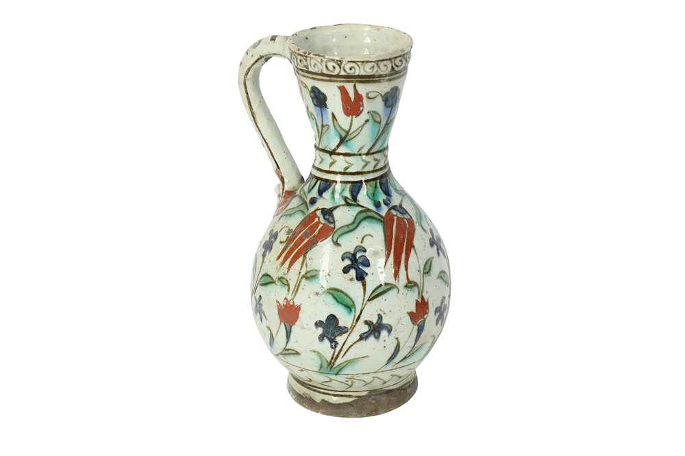 AN IZNIK POTTERY JUG Ottoman Turkey, ca. 1580 - 1600