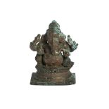 A COPPER-ALLOY DEVOTIONAL ICON OF GANESHA South India, 17th - 18th century