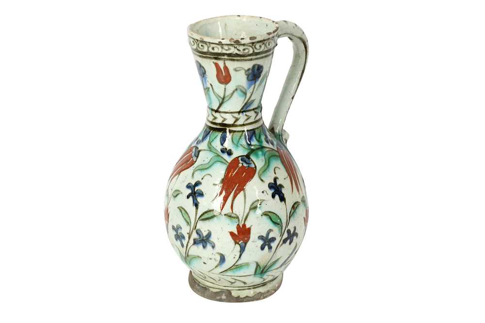 AN IZNIK POTTERY JUG Ottoman Turkey, ca. 1580 - 1600 - Image 2 of 5