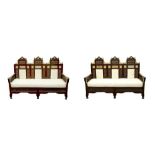 λ A NEAR PAIR OF MOTHER-OF-PEARL AND BONE-INLAID ORIENTALIST MASHRABIYA-STYLE SETTEES Egypt, mid to