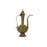 A ZAND-STYLE SILVER-INLAID BRASS EWER MADE FOR THE IRANIAN MARKET Possibly Damascus, Syria, late 19t