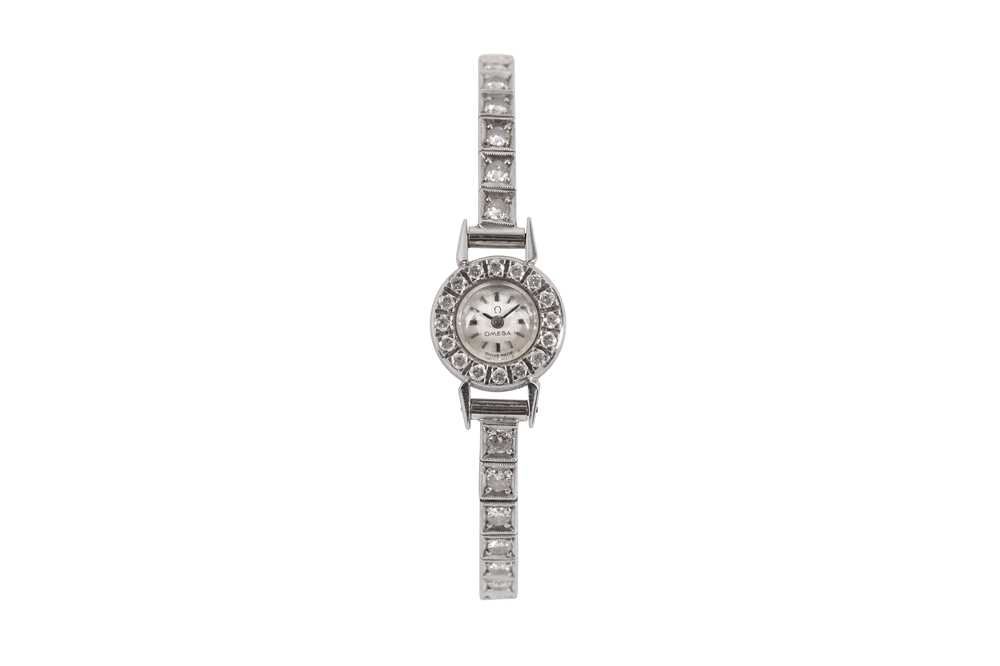 OMEGA WHITE GOLD AND DIAMONDS.